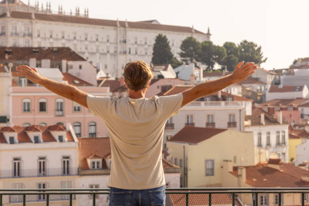 istock Man with Open Arms Enjoying City View 2156783347