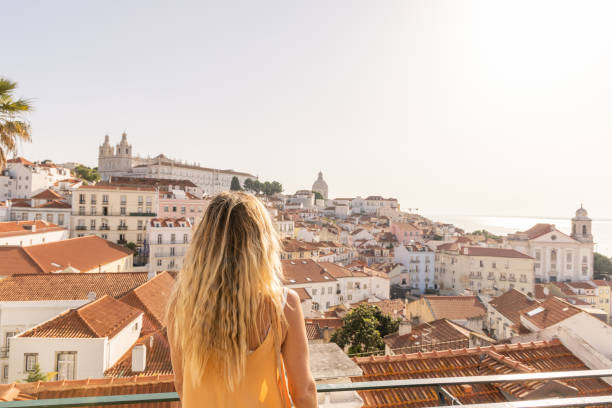 istock Woman Admiring Historic Cityscape 2156783489
