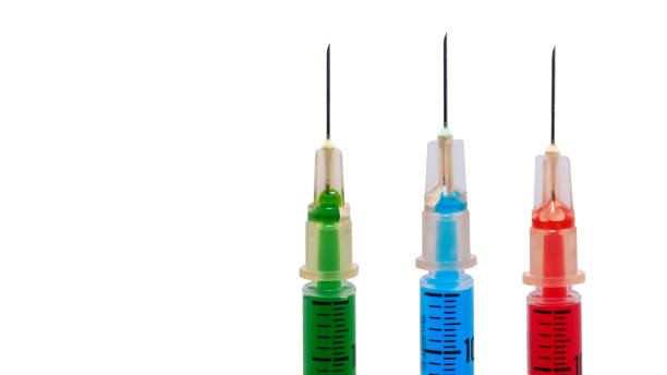 istock 1 ml syringe filled with fake blood on white background 2156785488