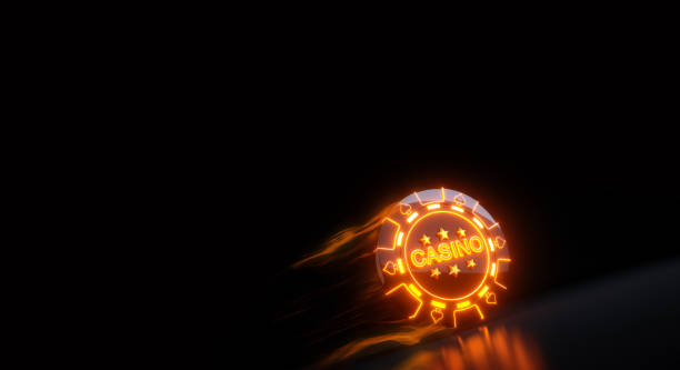 istock Fiery Gambling Chips with Spades Symbol Concept Accented with Neon Lights. 2156792355