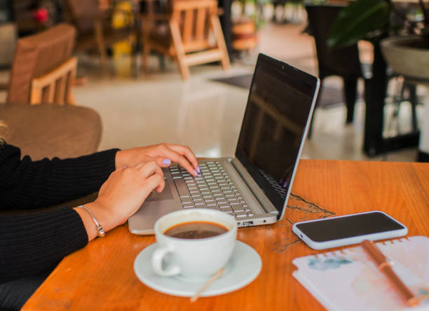 istock hands of a woman using her laptop 2156793466