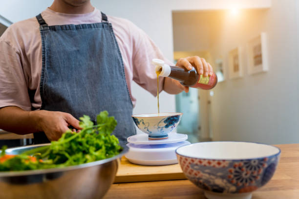 istock Chef at the kitchen preparing spicy glass noodle salad 2156793808