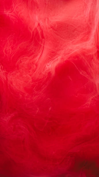 istock Steam floating ink water splash vivid red vapor 2156798043