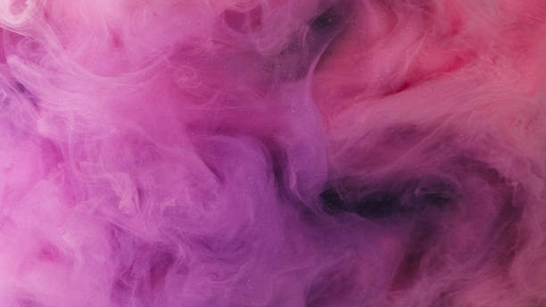istock Glitter mist swirl paint water mix pink smoke flow 2156799108