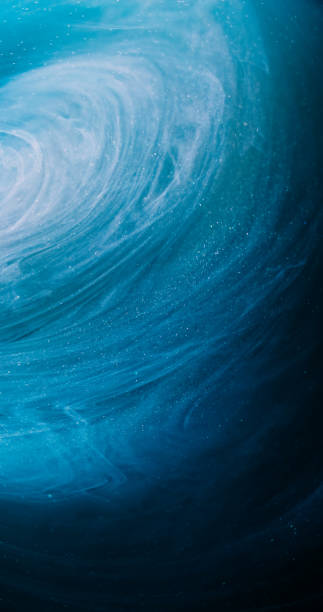 istock Shimmering swirl mist vortex blue shiny paint dark 2156799318