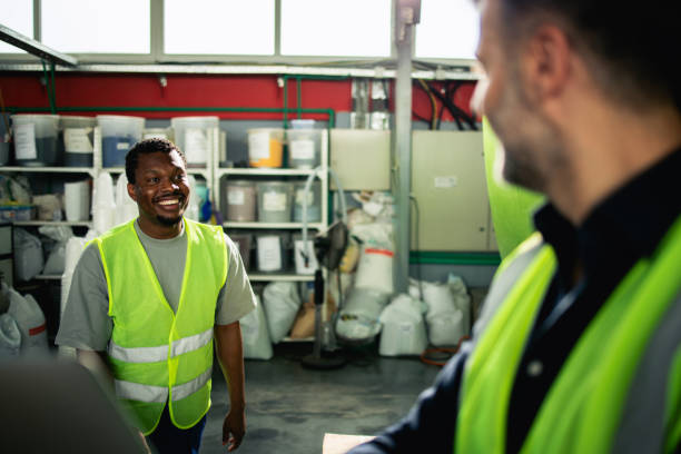 istock Two colleagues cooperating at the factory 2156799966