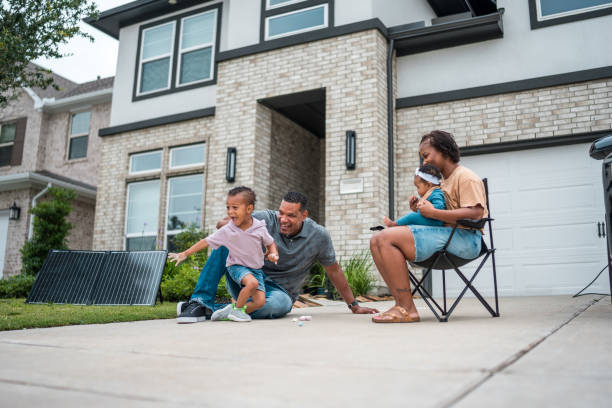istock Diverse Family Enjoying Time Outside Their Eco-Friendly Home 2156804521