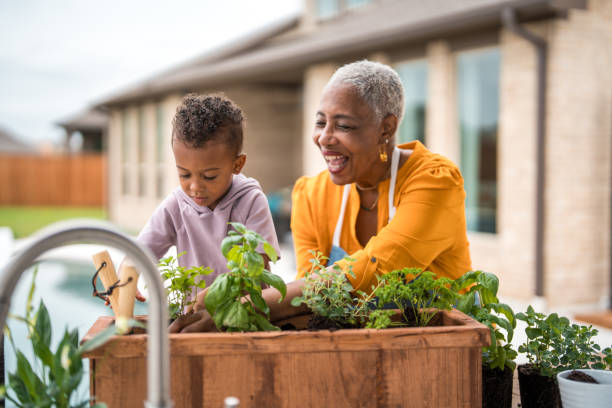 istock Diverse Family Gardening Moment 2156804775