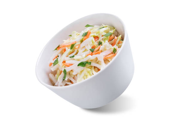 istock Radish cabbage coleslaw in a bowl on a white isolated background 2156811299
