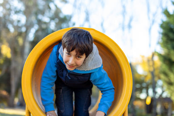 Portrait of a child girl playing at outdoors playground