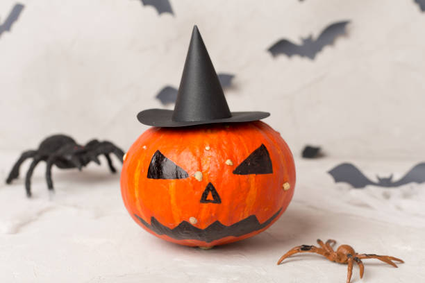 istock Halloween composition with jack o lanter decor on concrete table 2156823653