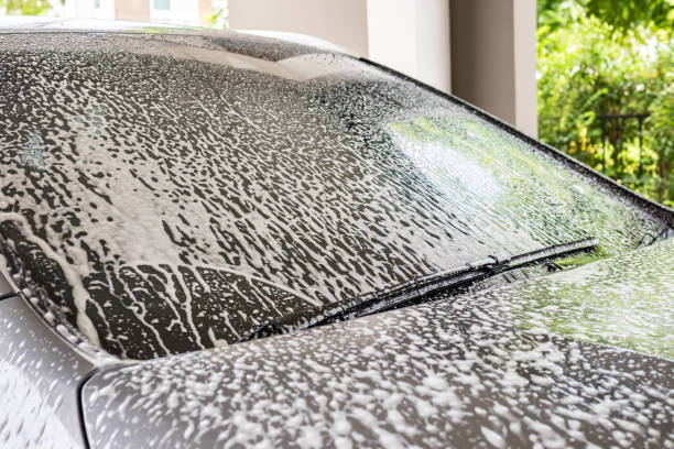 istock car cleaning and washing with foam soap 2156837763