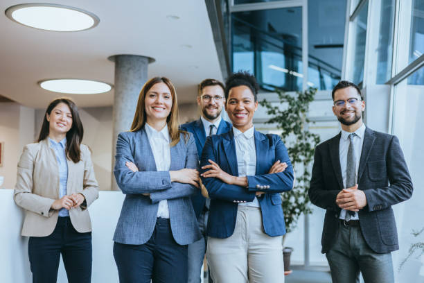 istock Team of professionals in office setting 2156837971
