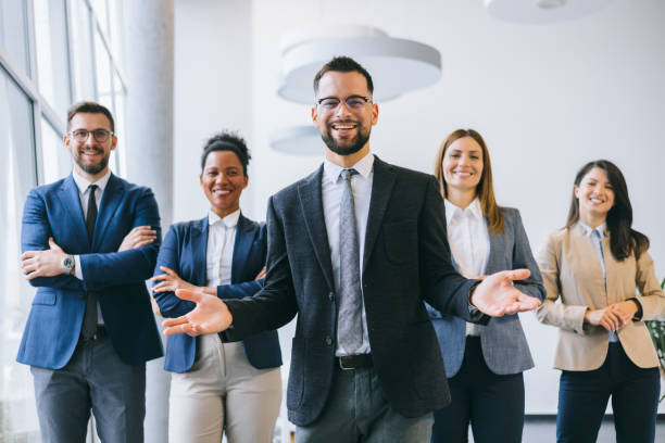 istock Businessman presenting in front of colleagues 2156837977
