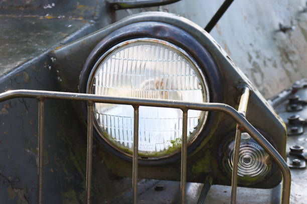 istock Powerful spotlight close-up on old military equipment. 2156838026