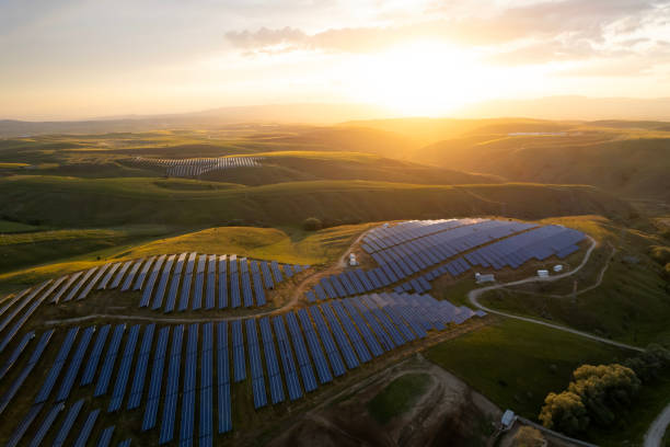 istock Aerial view of solar panel at sunset set 2156838612