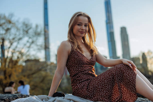 istock Woman posing in Central park with a contemplative look 2156838774