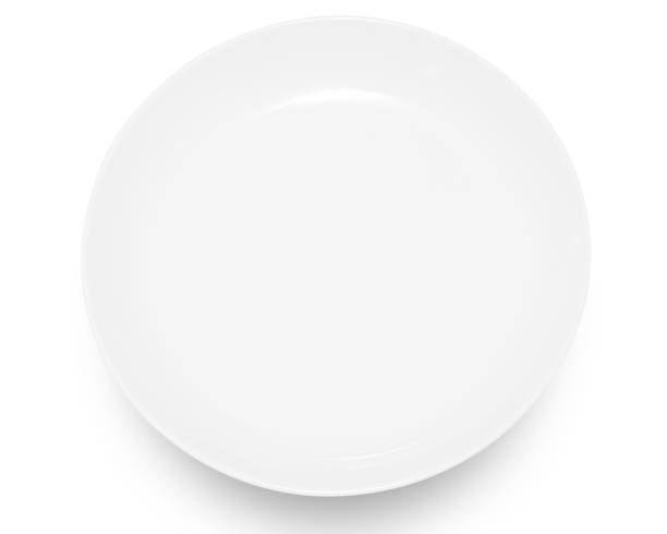 istock White circle ceramics plate isolated on white background. 2156842944