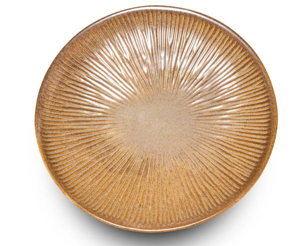 istock Brown circle ceramics plate isolated on white background. 2156842987