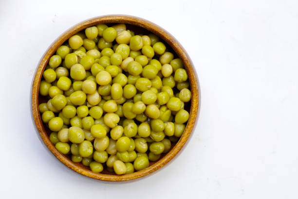 istock Canned green peas on white background. 2156843198