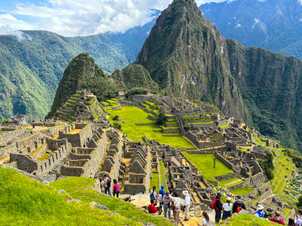 Machu Picchu Under Blue Sky and Dramatic Clouds in the Morning, Peru