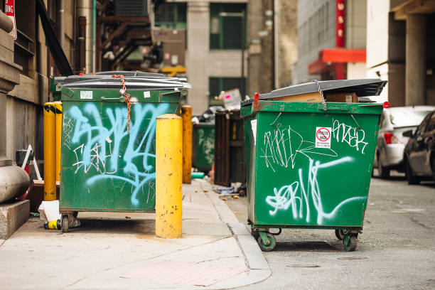 Painted trash cans on a street in Philadelphia, Pennsylvania June 9, 2024