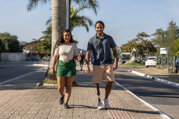 istock Latin couple chatting and walking down the street 2156848228