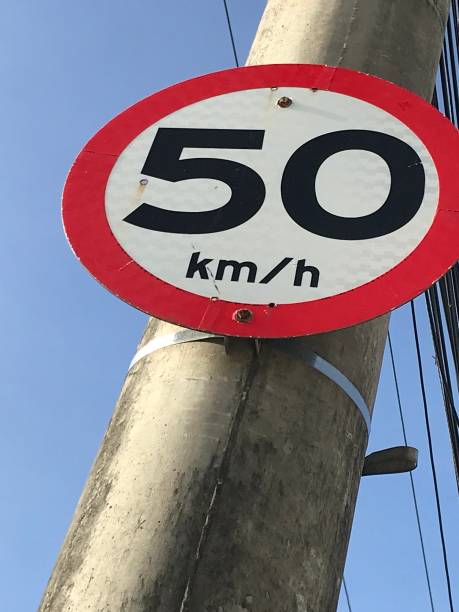 istock Maximum Speed limit sign 50 km/h. Road sign icon on sky background. 2156856135