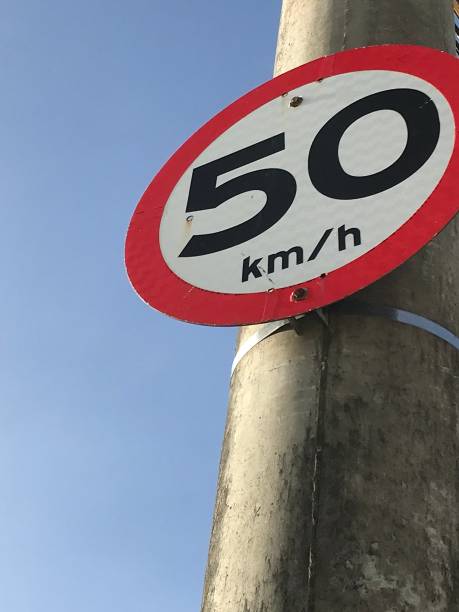 istock Maximum Speed limit sign 50 km/h. Road sign icon on sky background. 2156856145