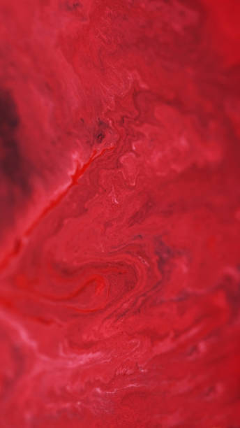 istock Ink spill acrylic liquid flow red paint water dye 2156856455
