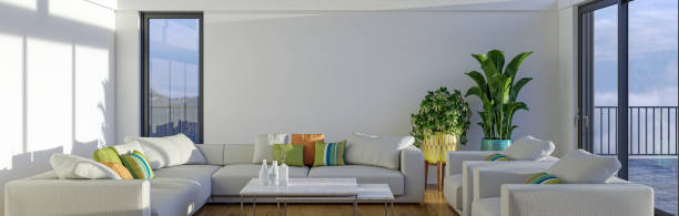istock Modern 3d illustration Banner Relaxing and Comfortable Modern Living Room with Sofas Armchairs Windows Rugs Coffee Tables Curtains and Bookshelves 2156863759