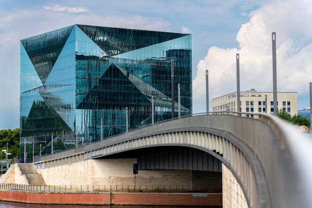 Berlin, Germany - June 07, 2024: View of the modern office building Cube at the main train station in Berlin, horizontal