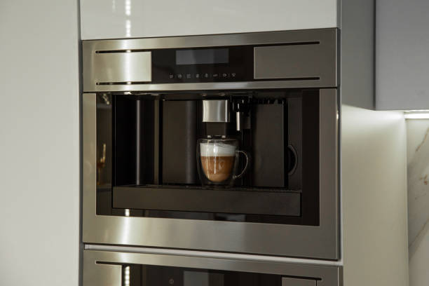 istock Integrated built-in coffee machine making coffee in double wall glass cup 2156868874