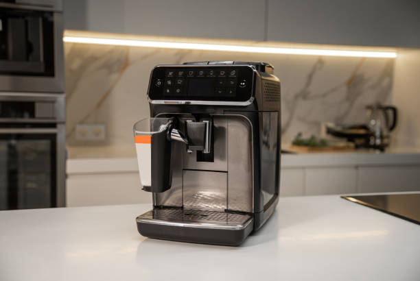 istock Modern electric espresso machine on white marble countertop in kitchen 2156868882