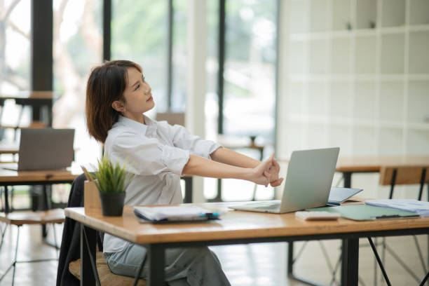 istock businesswoman Sitting and working on graph documents 2156870263