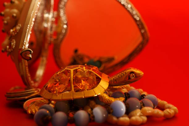 Turtle figurine and jewelry. Wealth and abundance.
