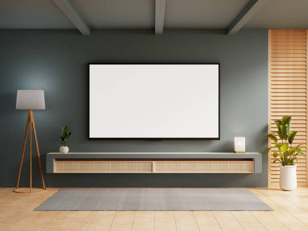 istock Smart TV on the dark blue wall in living room,minimal design- 3D rendering 2156876381