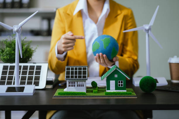 istock Businessman working virtual modern computer to reduce CO2 emissions carbon footprint climate change to limit global warming.Sustainable development and innovation green business concept. 2156881237
