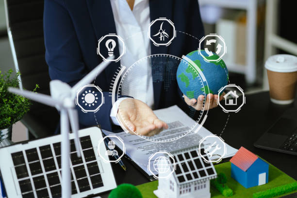 istock Businessman working virtual modern computer to reduce CO2 emissions carbon footprint climate change to limit global warming.Sustainable development and innovation green business concept. 2156881239