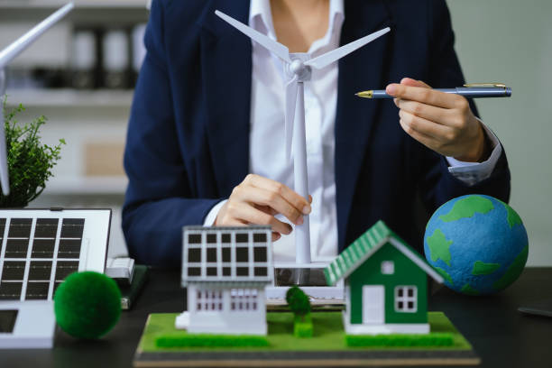 istock Businessman working virtual modern computer to reduce CO2 emissions carbon footprint climate change to limit global warming.Sustainable development and innovation green business concept. 2156881242