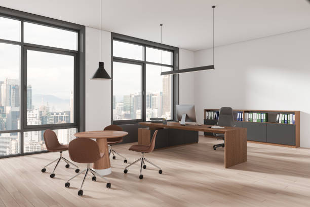 istock Modern office interior with meeting table and chairs, ceo workplace near window 2156882220