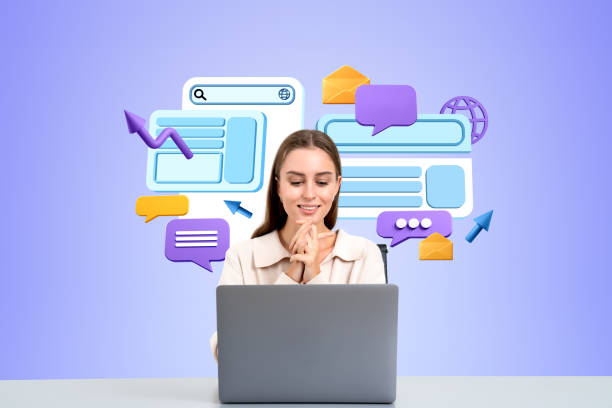 istock Smiling woman working with computer on desk, website screens and social media 2156882607