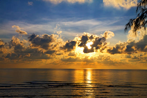 Sunrise on water in morning at beach Hat Ban Krut Prachuap Khiri Khan Province in Thailand is famous for travel and relax