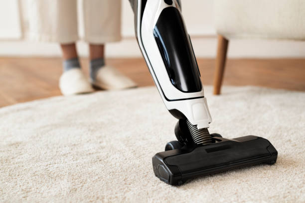 istock Vacuum cleaning a rug on the floor 2156883428