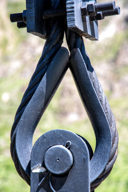 istock Steel cable and rope fastening system with iron loop and hook 2156884628