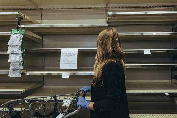 istock Empty shelves at the supermarket due to COVID-19 panic 2156885232