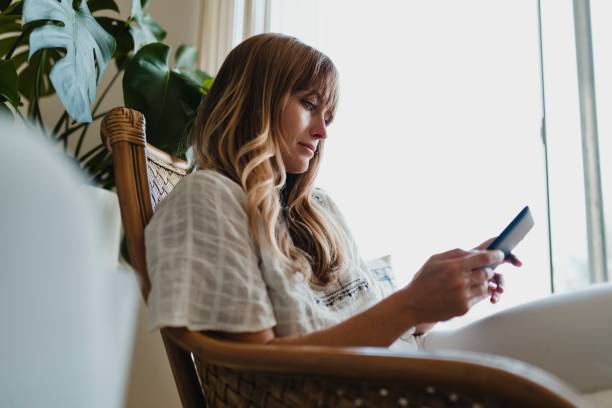istock Woman using a digital tablet during coronavirus quarantine at home 2156885501