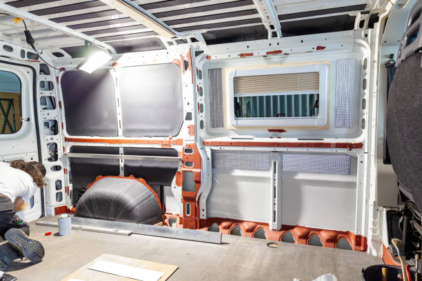 istock Camper van conversion. Insulation Floor of the transporter, motorhome after anti-rust paint. Conversion DIY Jumper van, foam insulation inside of a camper van 2156886738
