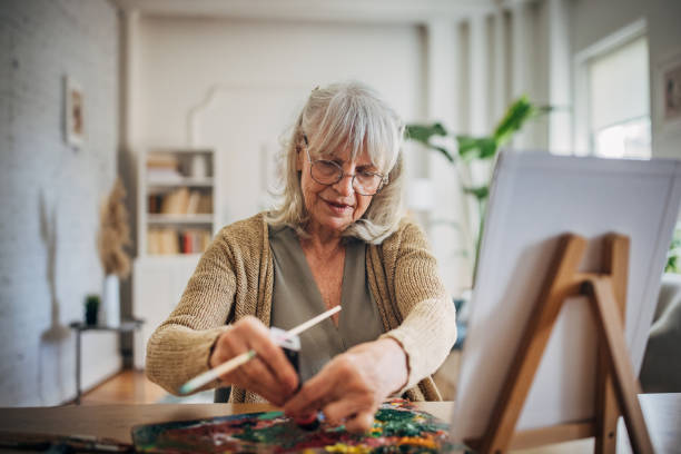 istock Senior woman doing arts 2156887424