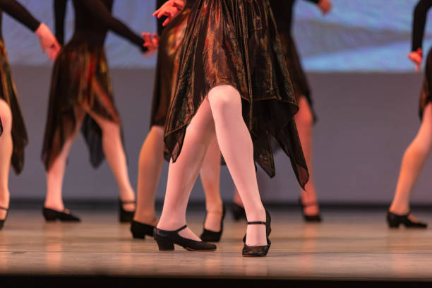 istock Closeup of ballerinas dancing on stage. 2156889989